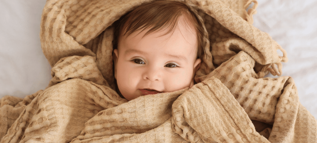 Baby awake after a short nap as sleep cycles continue to develop